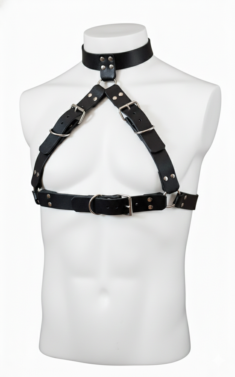 Black leather harness on a mannequin bust against a white background