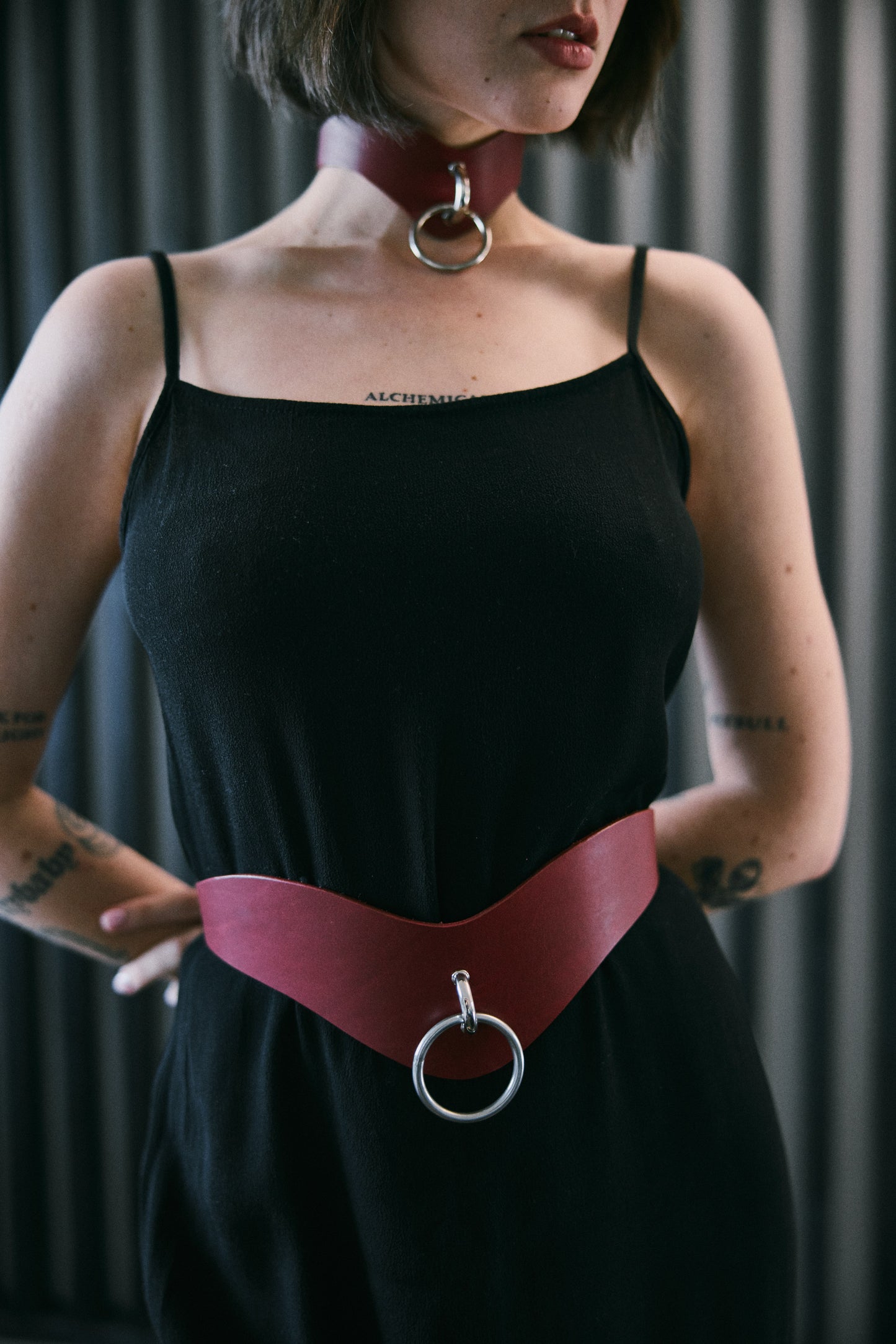 Woman's premium leather curved red belt for luxury fashion 