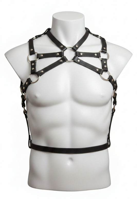 Black leather harness on a mannequin torso against a white background